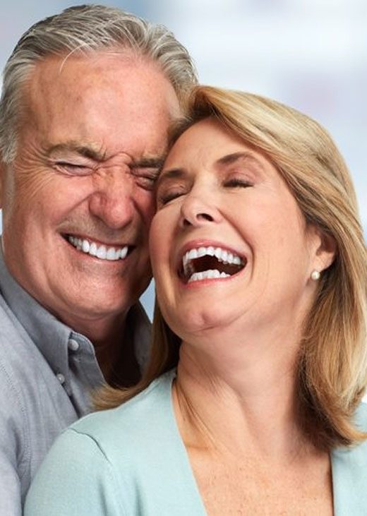 Senior Couple Smiling — Crestwood Family Dental In Molendinar, QLD