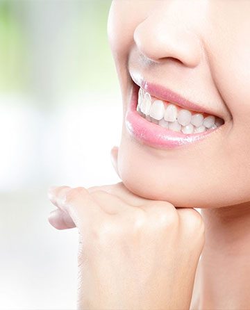 Woman Smiling With White Teeth Mobile — Crestwood Family Dental In Molendinar, QLD
